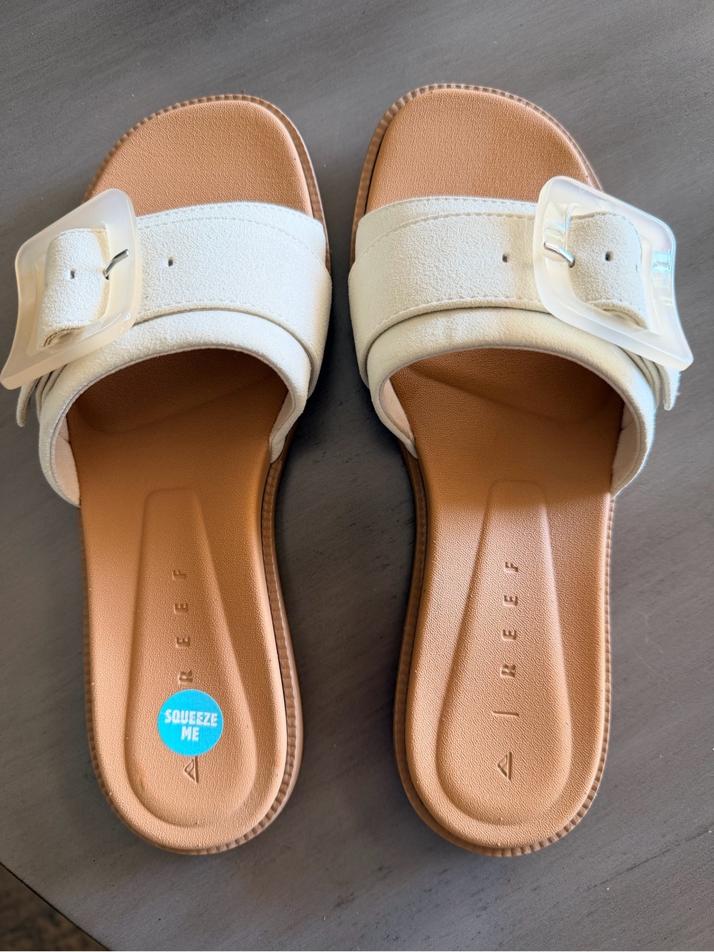 Reef Women’s Cream Slide Sandals with Clear Buckle